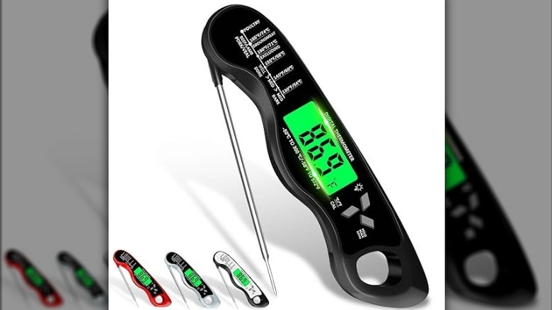 A digital thermometer sits next to smaller versions, displaying various colors.