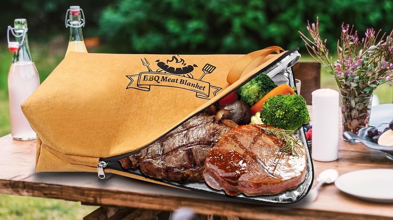 A resting meat blanket is full of different types of meat and vegetables.