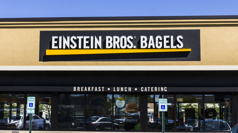Exterior of Einstein Bros. Bagels storefront during the day.