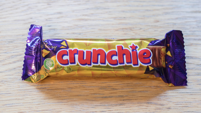 An unopened Cadbury Crunchie bar.