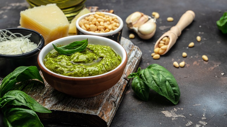 pesto sauce in bowl on wood