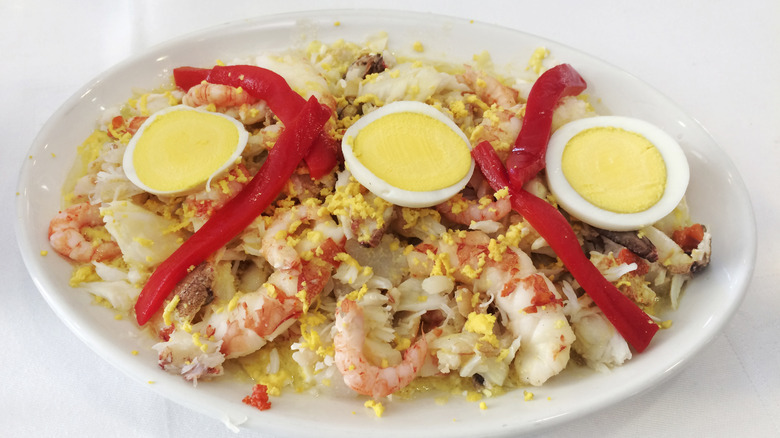 A seafood salmagundi against a white background.