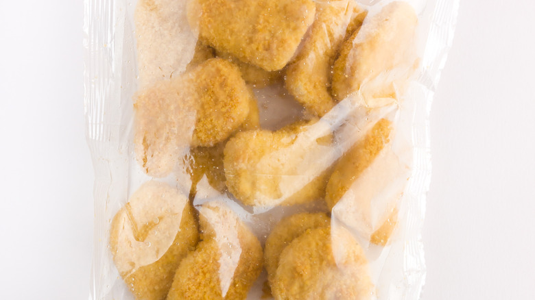 Frozen chicken nuggets in plastic bag