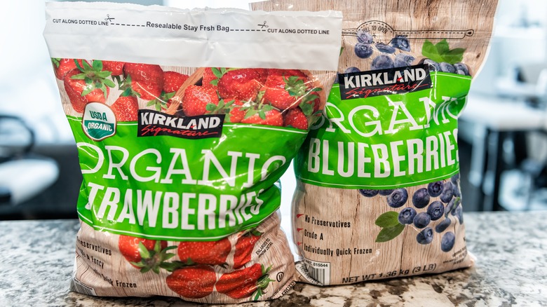 Bags of Kirkland Signature frozen berries on counter
