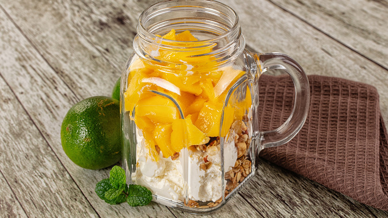 Jar of ricotta and mango.