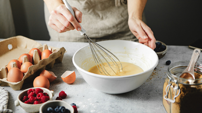 Whisking batter in bowl