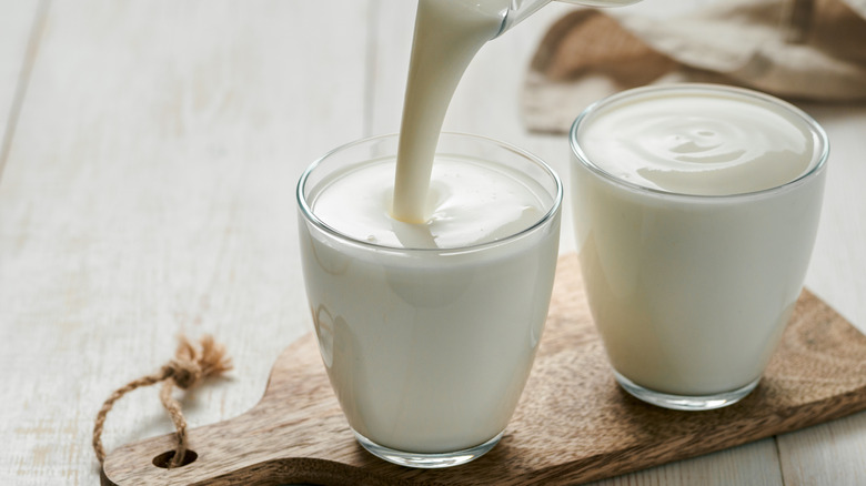 Buttermilk pouring into glass