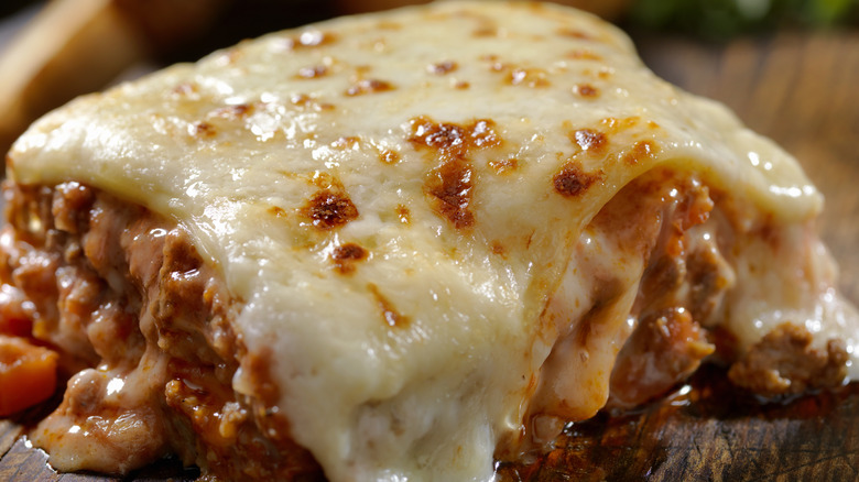 lasagna with melted cheese on top/signs of broiler