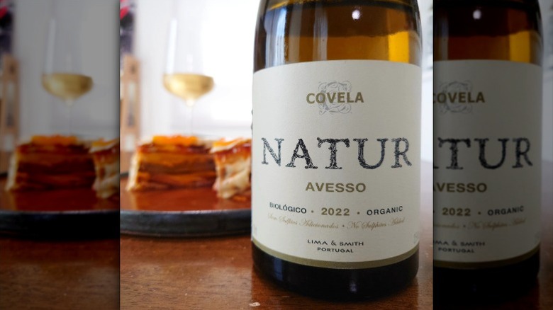 Closeup of a bottle of Avesso on a wooden table