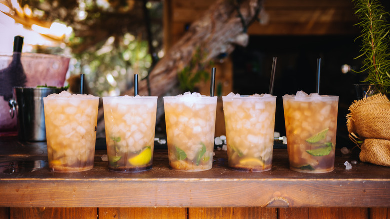 Row of fresh mojito cocktails