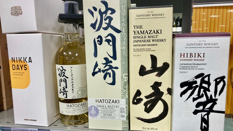 Shelf full of various Japanese whiskies