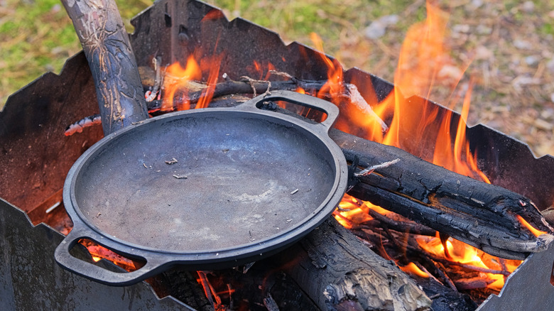 heating cast iron over fire