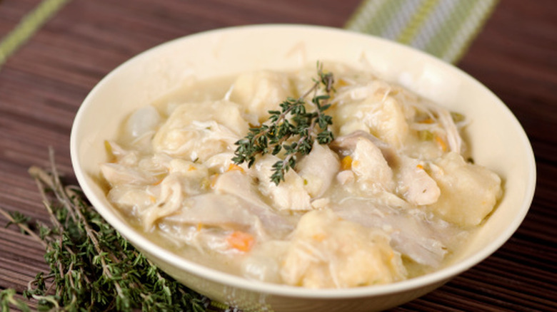 A bowl of chicken and dumplings
