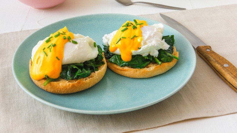 Eggs florentine topped with cheese sauce