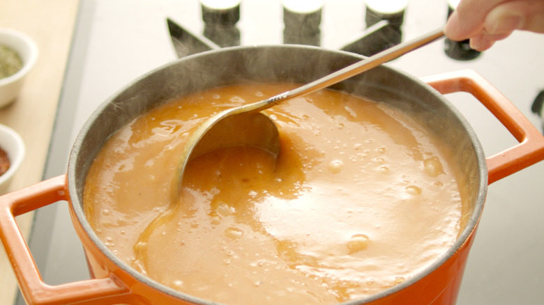 stirring soup