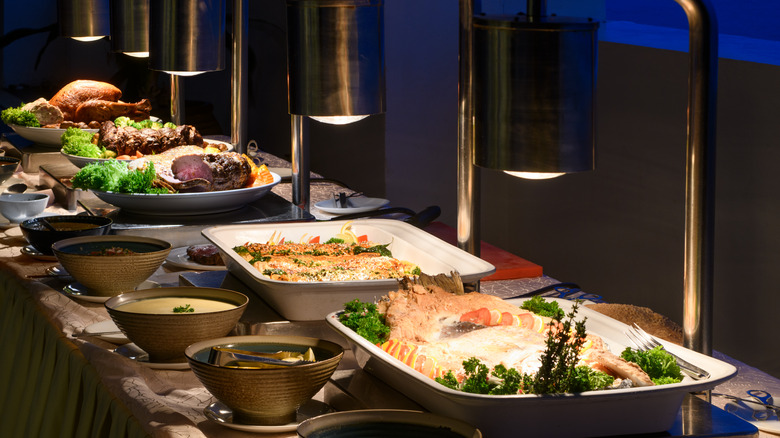 Heating lamps over dishes on a buffet