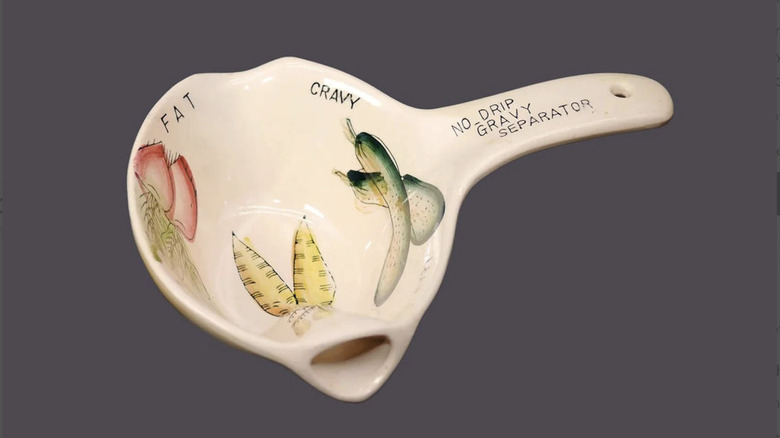 A illustrated gravy seperator