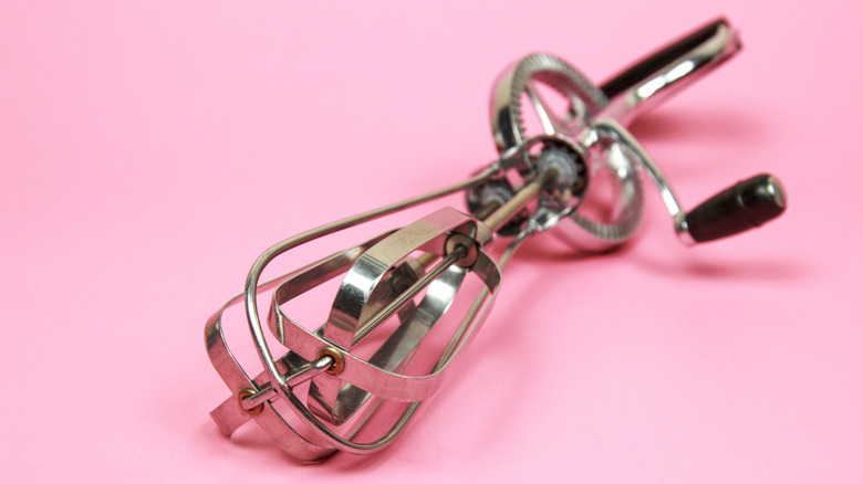 A hand cranked egg beater.