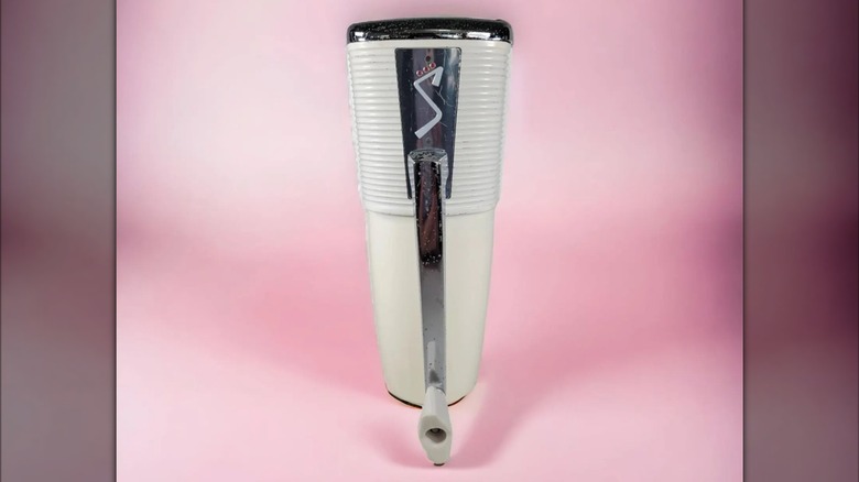 An image of a white wall-mounted ice crusher