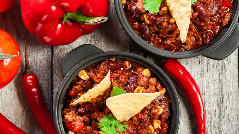 bowl of chili by peppers