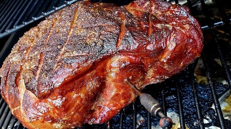 Pork butt on a smoker