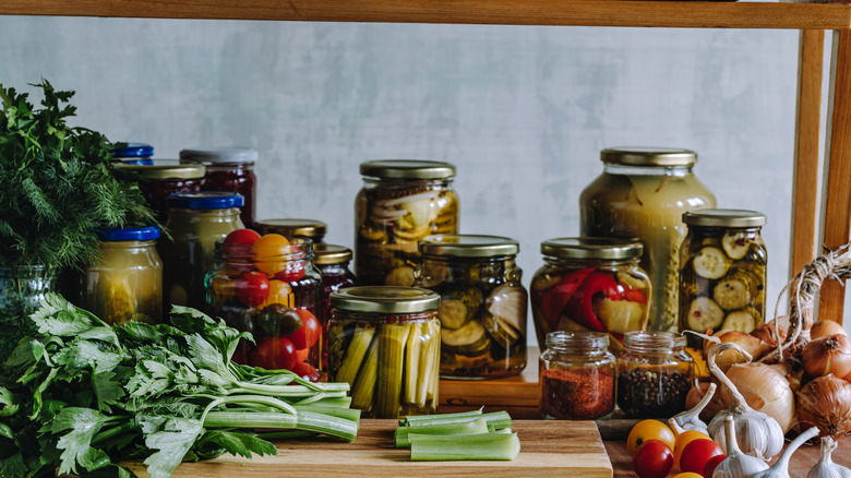 Assorted pickled vegetables in jars