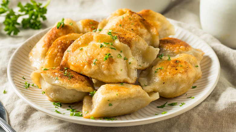 Fried pierogis on plate