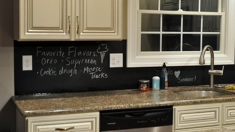 chalkboard backsplash with writing on it