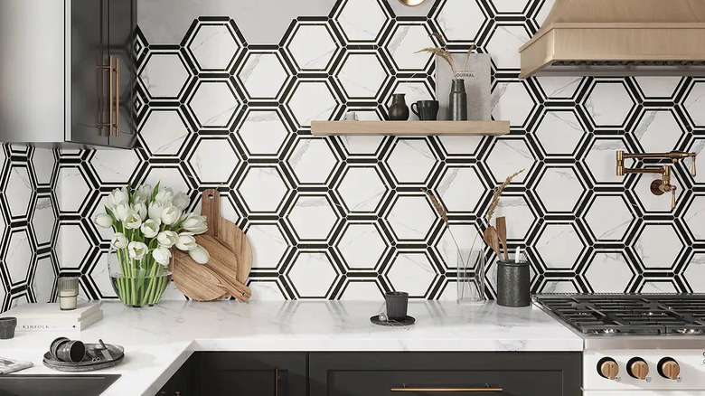 white and black honeycomb tile backsplash
