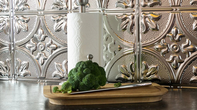 silver-colored tin tile backsplash