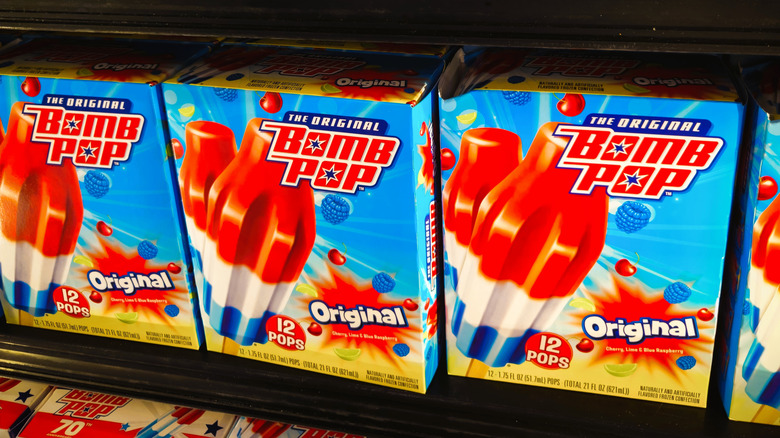 Boxes of Bomb Pop Original Ice Pops on display in a store freezer