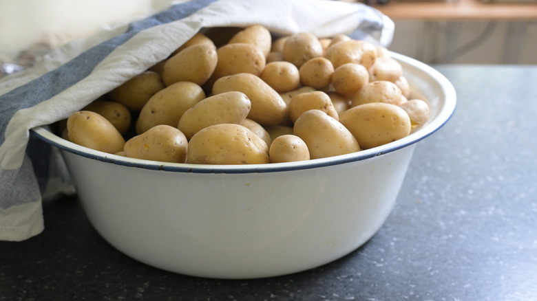 New potatoes in a cloth-covered bowl.