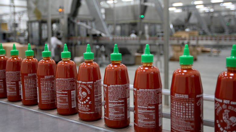 Huy Fong bottles in factory