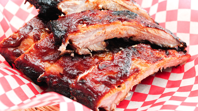 cooked ribs on parchment paper