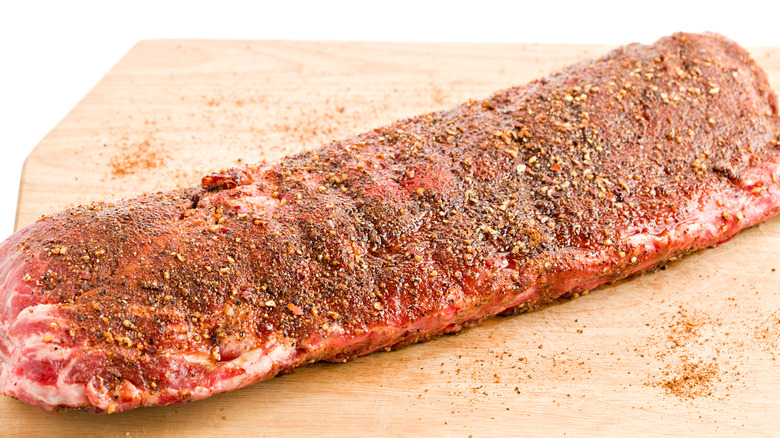 seasoned ribs on cutting board