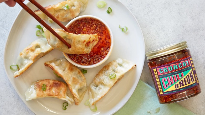 Dumplings dipped into TJ's Crunchy Chili Onion.