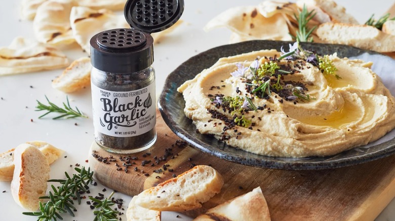 Hummus topped with TJ's Ground Fermented Black Garlic.