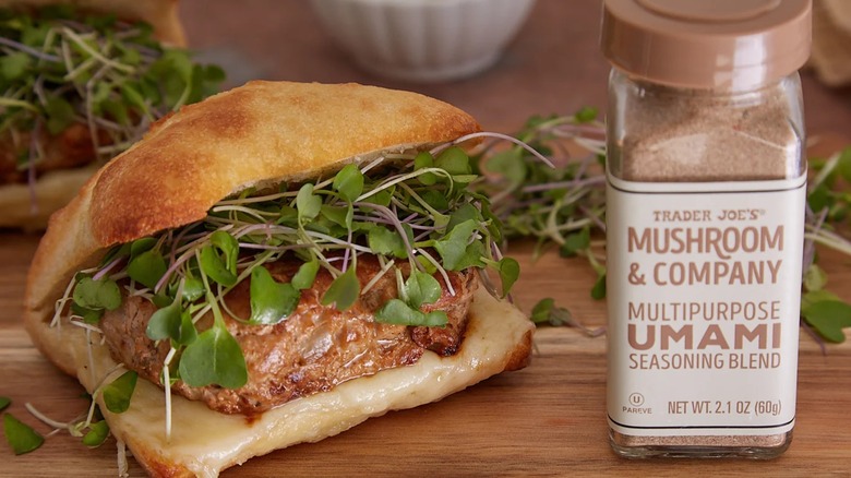 TJ's Mushroom & Company Multipurpose Umami Seasoning Blend alongside a sandwich.