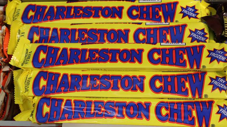 A stack of Charleston Chew candy sits on a store shelf