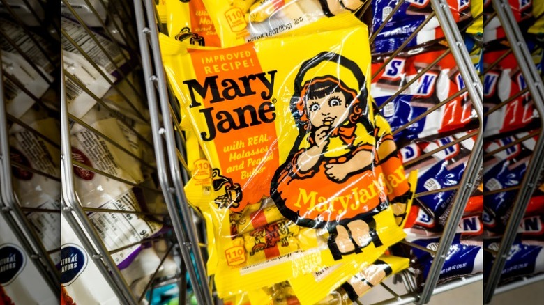 A pack of Mary Jane candy sits among piles of various candies