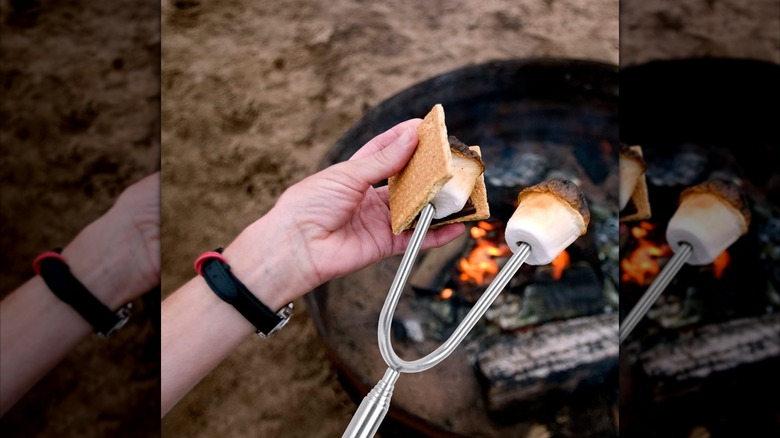 The Briout roasting stick with a marshmellow on it