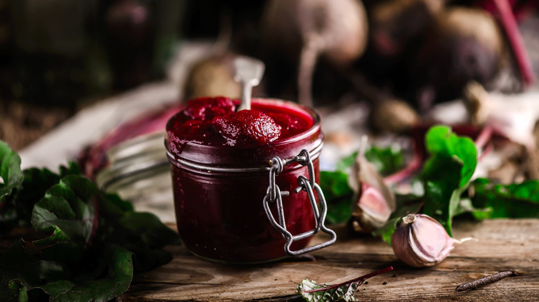 Homemade beetroot ketchup in a glass jar