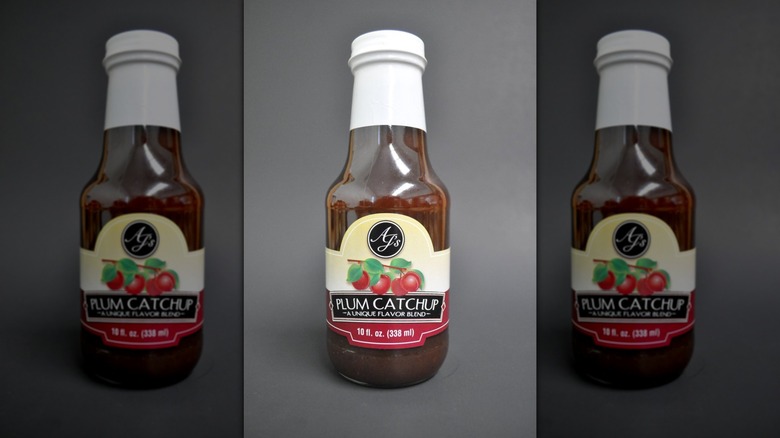 A glass bottle of plum ketchup
