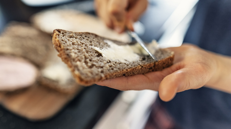 buttering bread