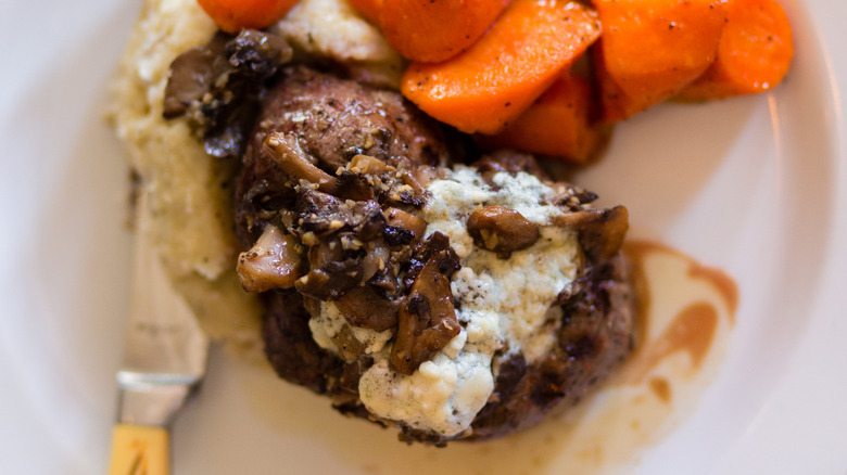 Grilled steak with cheese and mishrooms