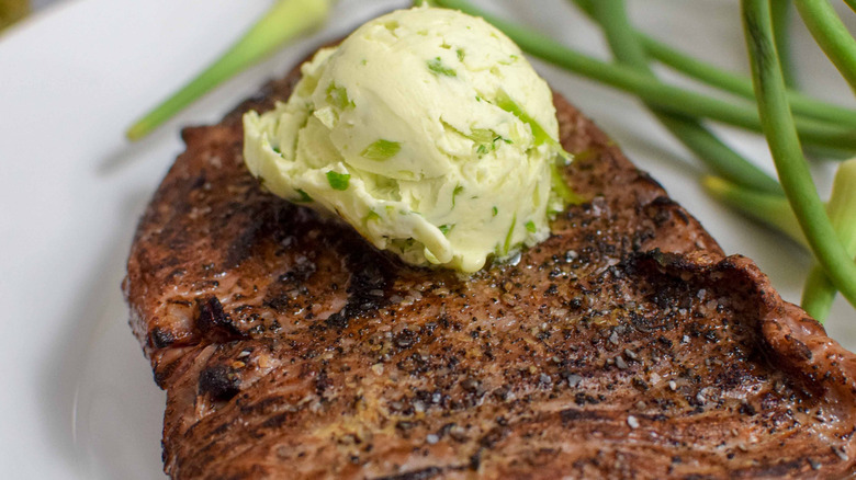 Steak with compound butter on top