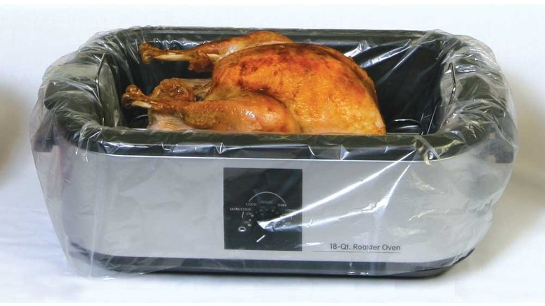chicken in an oven roaster with a liner