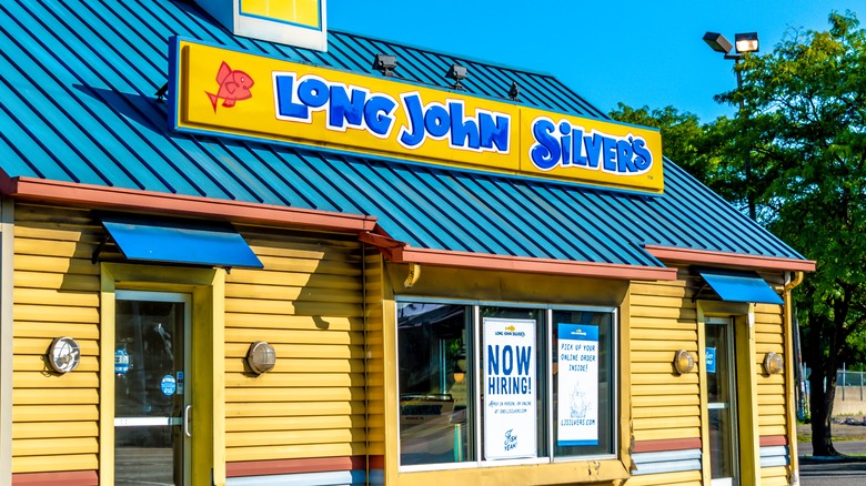 Vibrant yellow and blue exterior of a Long John Silver's restaurant
