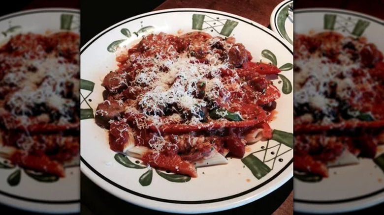 Sausage and peppers over pasta