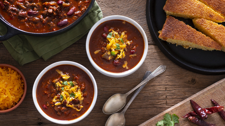 bowls of chili and cornbread